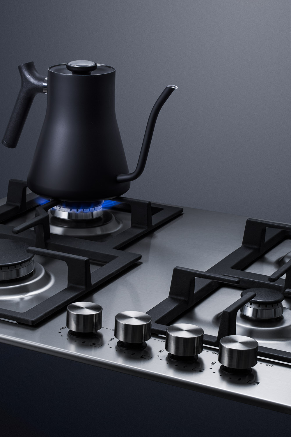 4-burner gas cooktop made in Italy with sealed burners, multiple heating outputs, a 304 grade stainless steel surface, and continuous cast iron grates for added durability